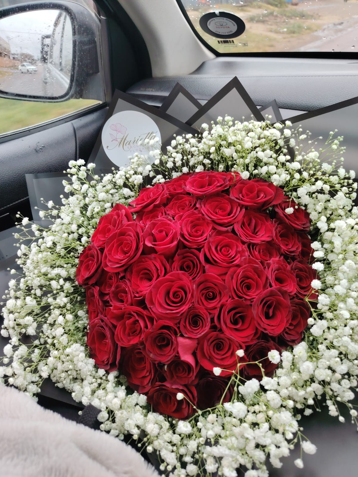 Signature red roses and gypsophila bouquet by Exclusive Florals